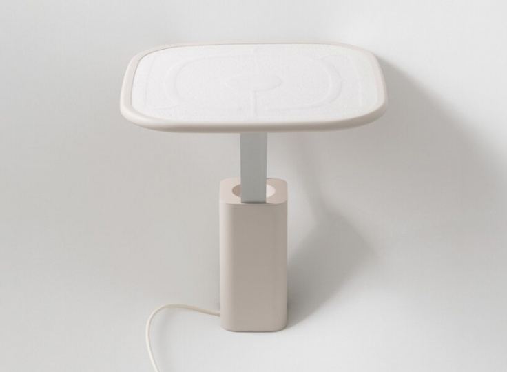 WINT Design Lab придумала лампу, яркость которой меняется за счет движения жидкого металла